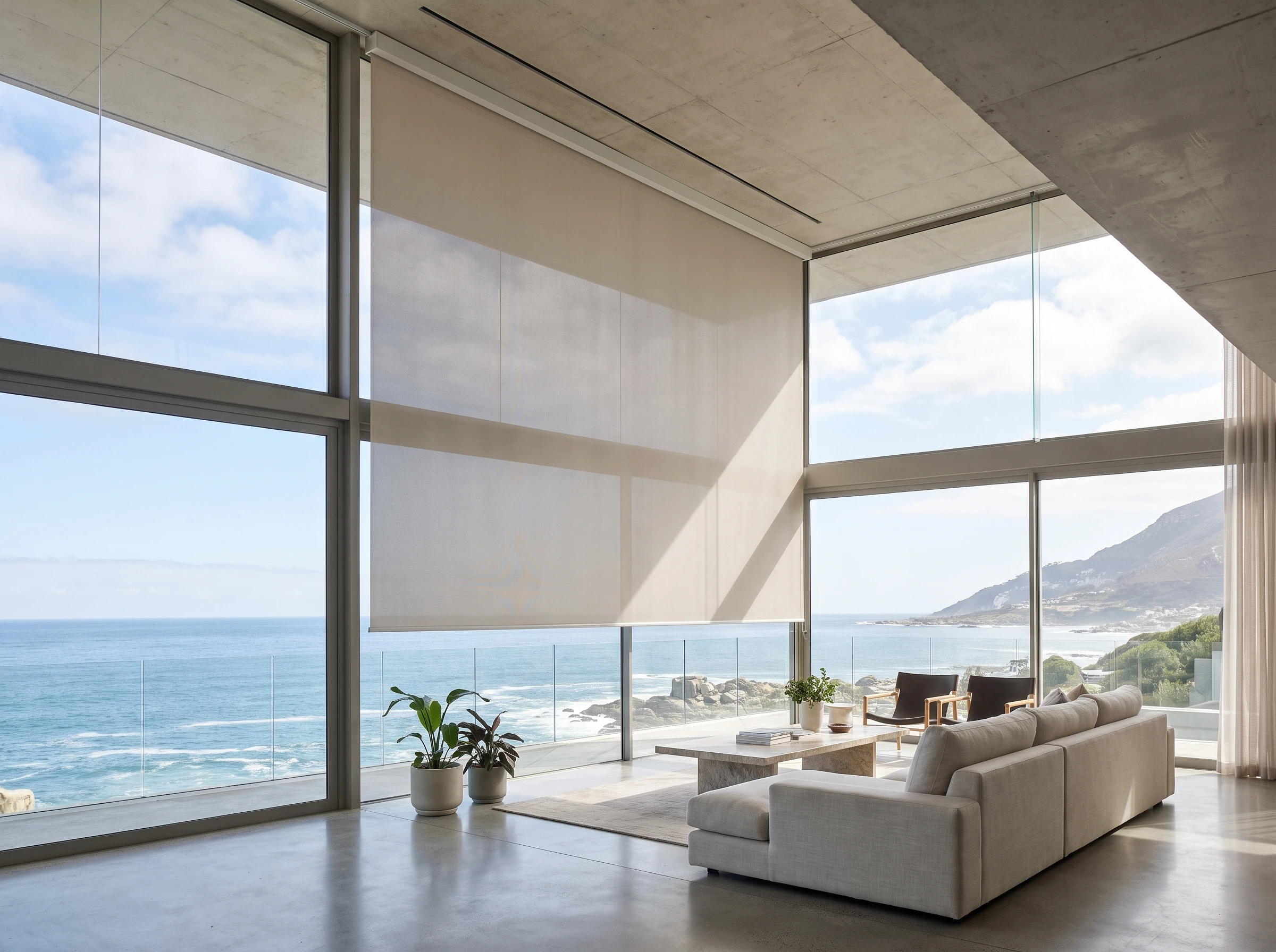 Concealed ceiling-recessed roller blind dropping from a hidden ceiling slot in a modern glass-walled Atlantic Seaboard lounge